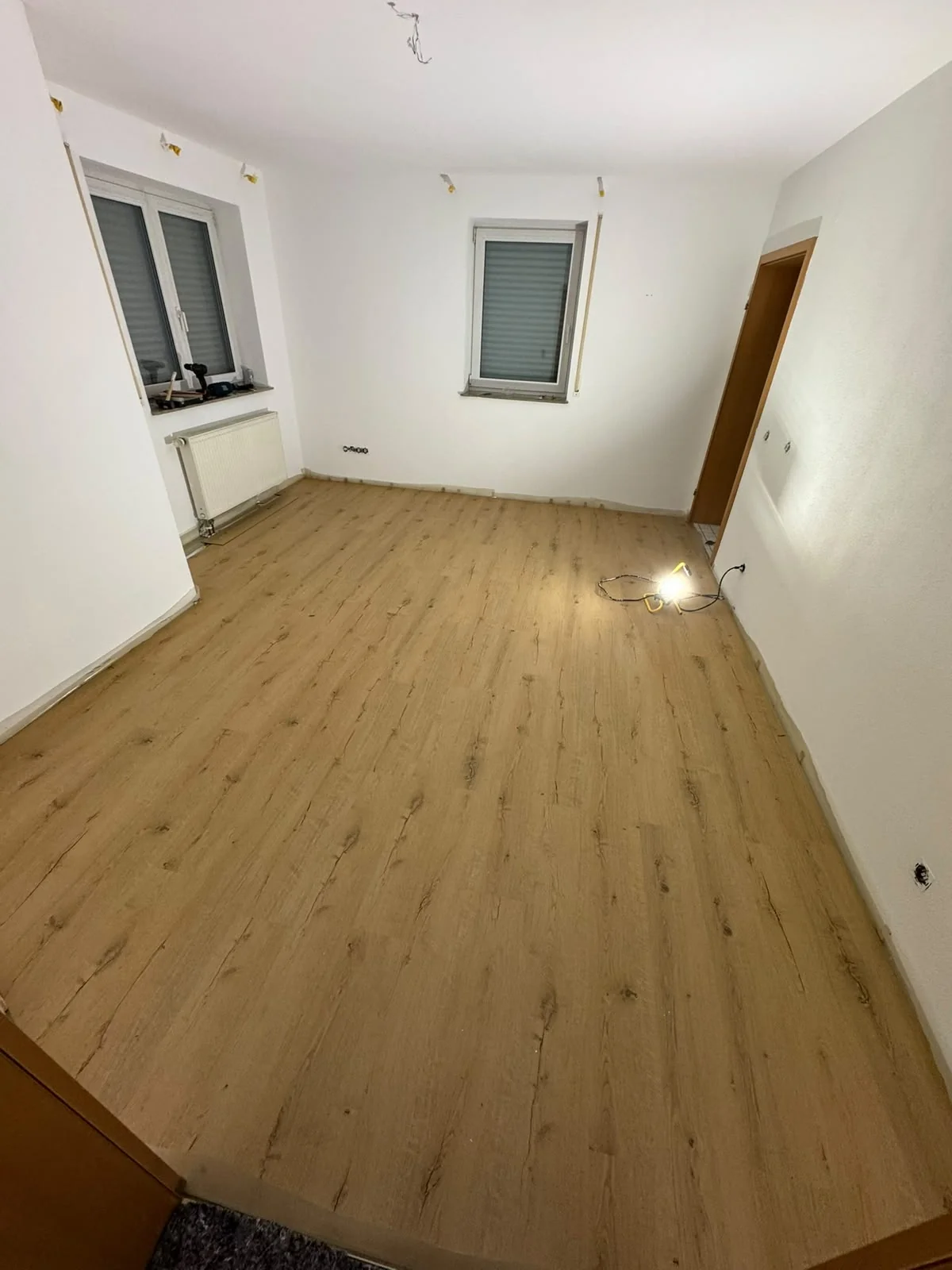 Room with new flooring at the documented project stage